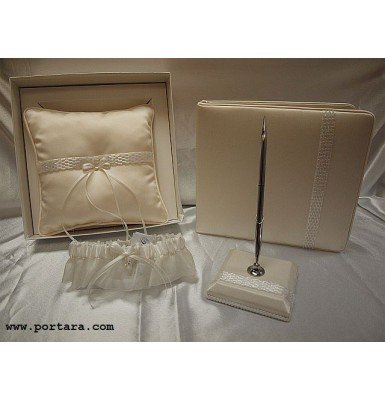 An Ivory Pearl Beauty Guest Book, Pen, Pillow and Garter Set