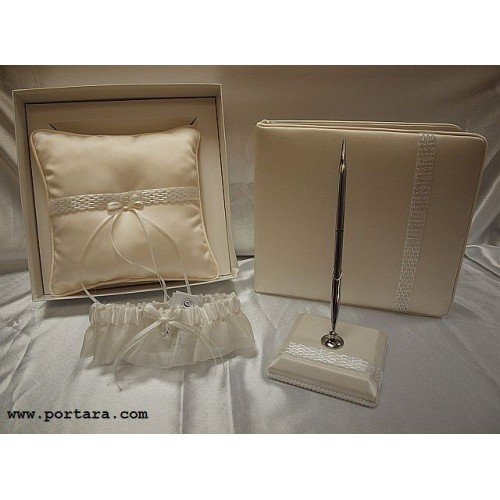 An Ivory Pearl Beauty Guest Book, Pen, Pillow and Garter Set